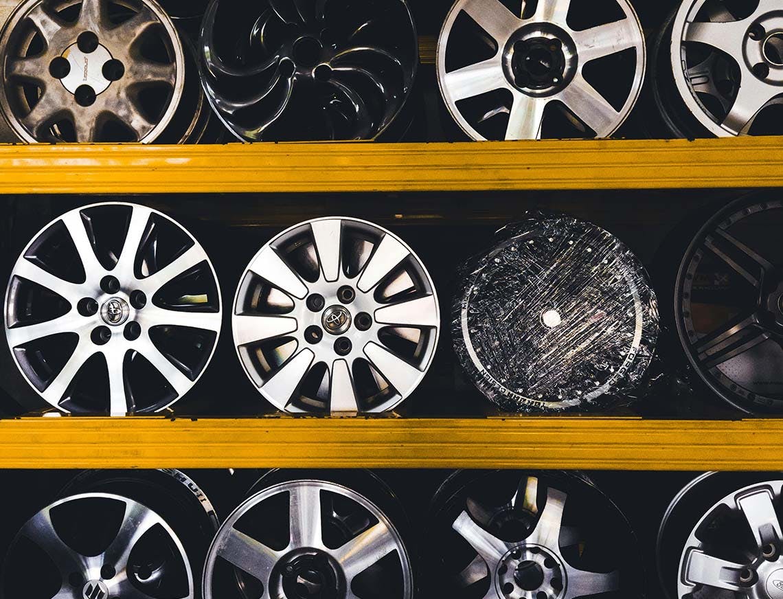 car rims on a shelf