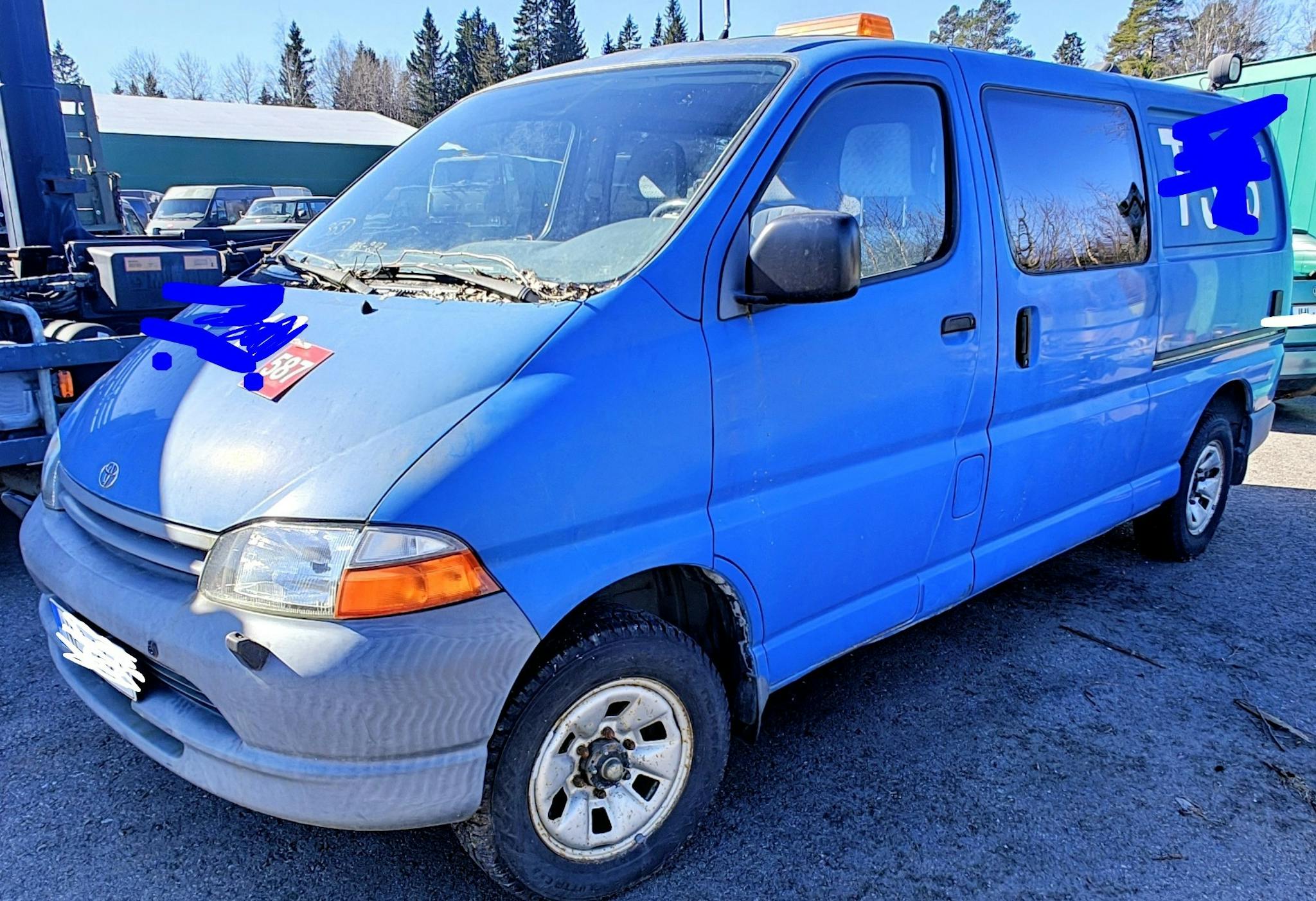 Sininen pakettiauto